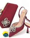 Sandalias de tacón puntiagudas y bolso, con diamantes florales