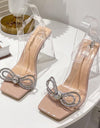 Sandalias elegantes transparentes de PVC con diseño