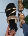 Sandalias de tacón plano de charol dorado para mujer