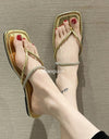 Sandalias planas doradas y plateadas para mujer